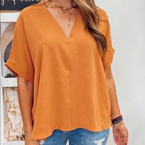 New Short sleeve blouse the color is off bcuz of lightning but it is NUDE!